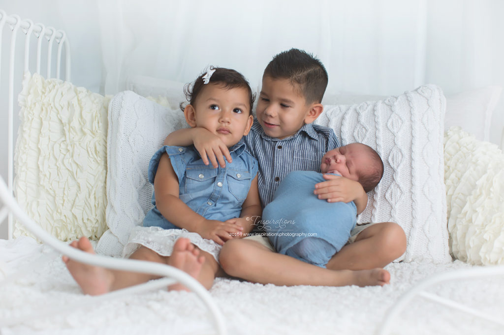 newborn baby boy with siblings
