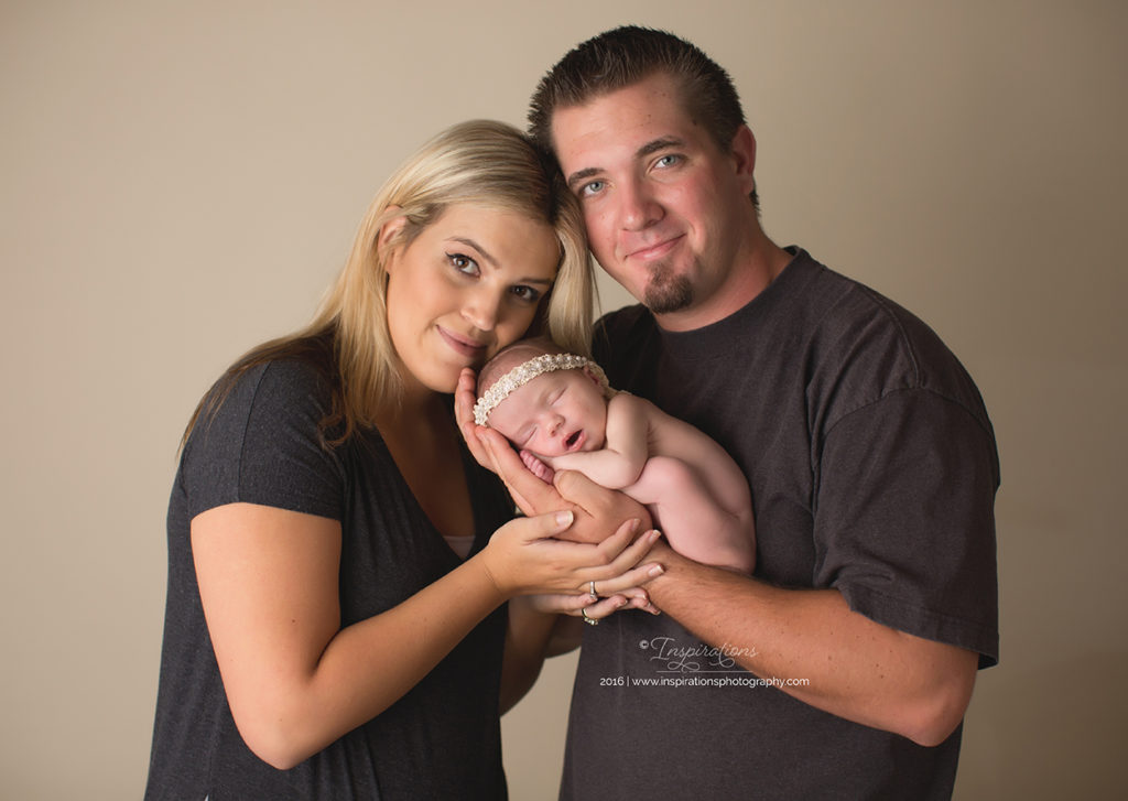 Family photo with newborn baby girl
