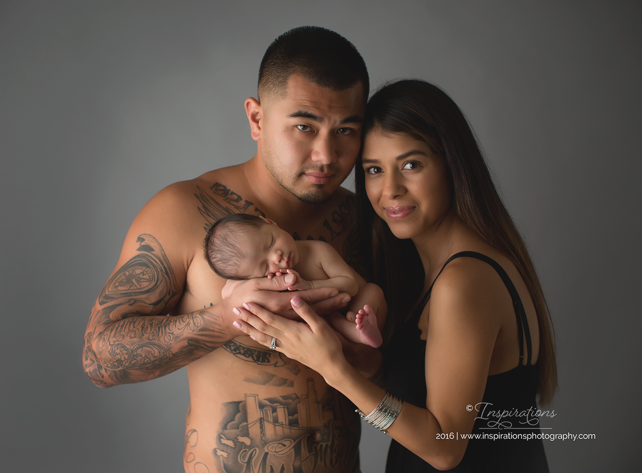 mom and dad with newborn photography